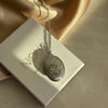 Silver Patterned Medallion