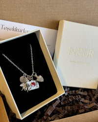 Design a Silver Charm Necklace - thumbnail 5